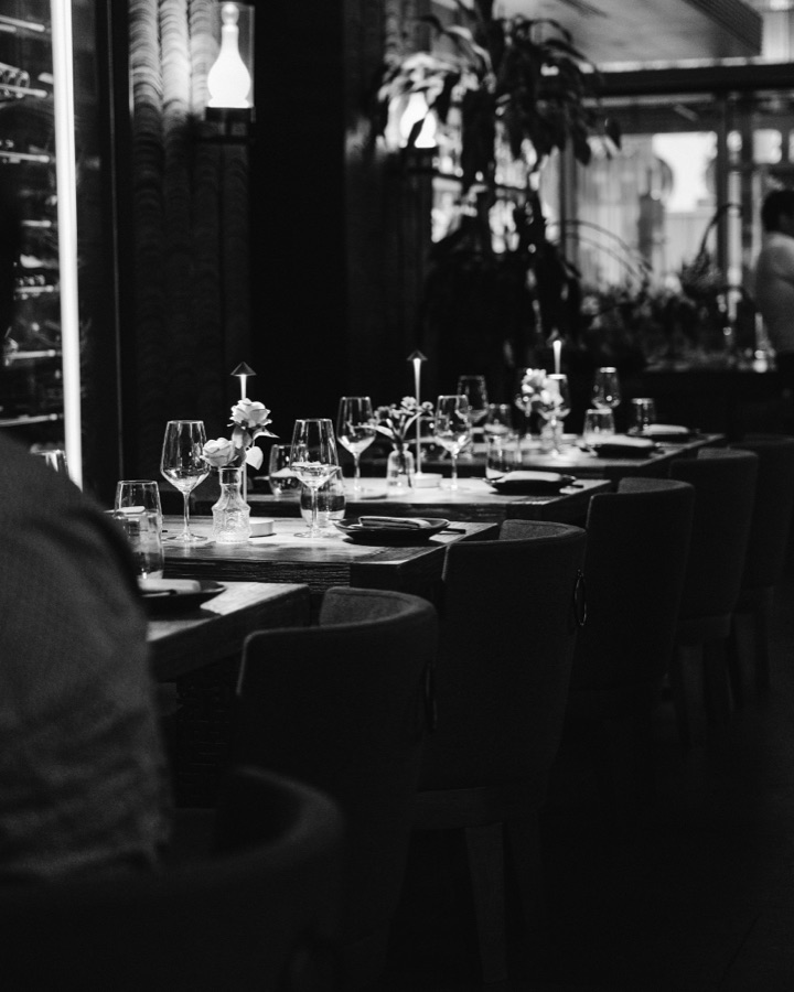 Dining room set for service, in black and white