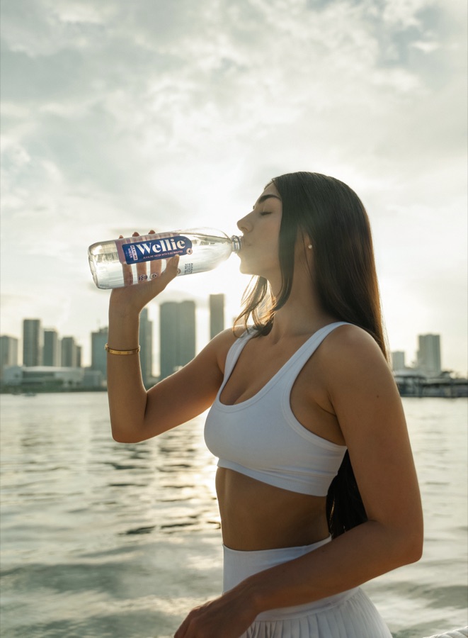 Lifestyle portrait by the bay with the skyline