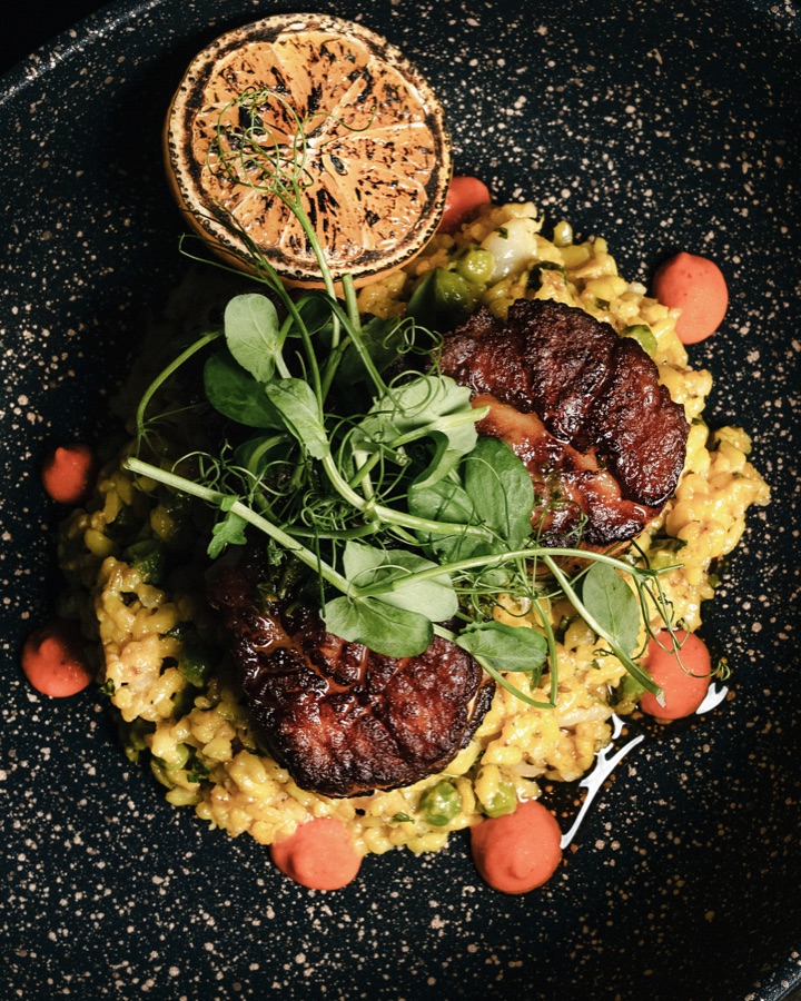 Grilled steak plated, seen from above